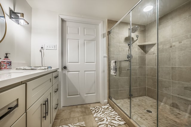 bathroom with vanity and an enclosed shower