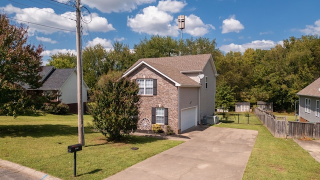 view of property with central AC unit, a front yard, and a garage