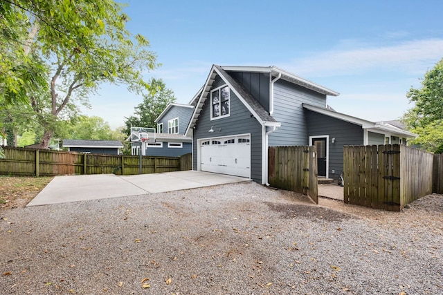 view of side of property with a garage