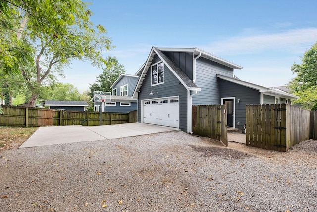 2310 Vaulx Ln, Nashville, TN 37204 - view of side of home featuring driveway and a garage