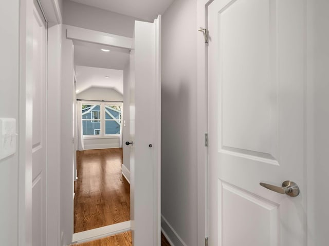 2310 Vaulx Ln, Nashville, TN 37204 - hall with lofted ceiling, wood finished floors, and baseboards