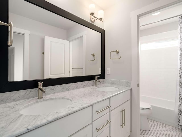 2310 Vaulx Ln, Nashville, TN 37204 - full bath featuring toilet, double vanity, tile patterned flooring, and shower / tub combo with curtain