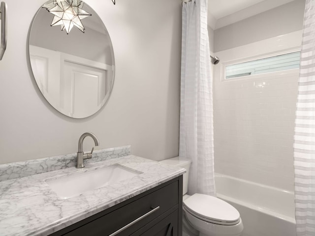 full bathroom featuring toilet, vanity, and shower / bathtub combination with curtain