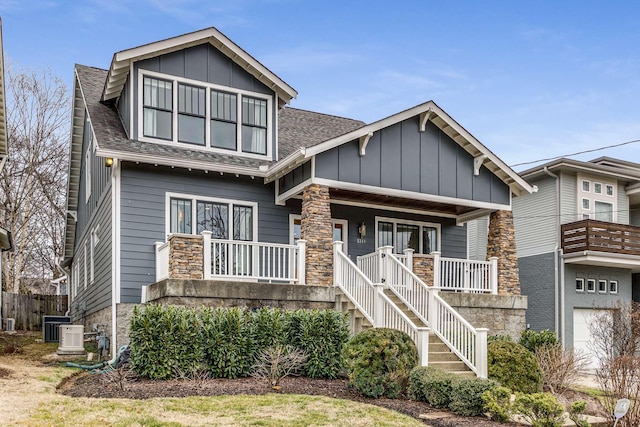 view of front of home featuring covered porch and central air condition unit