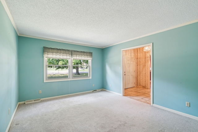 unfurnished bedroom with crown molding, a textured ceiling, and light colored carpet