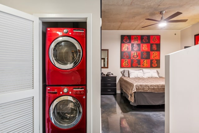 laundry area featuring laundry area, stacked washer / dryer, and a ceiling fan