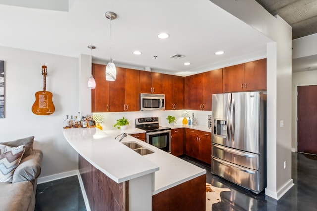 kitchen featuring decorative backsplash, hanging light fixtures, stainless steel appliances, kitchen peninsula, and sink