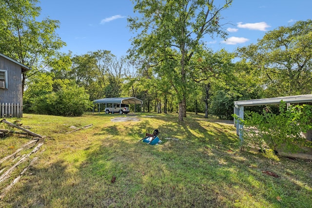 view of yard with a carport