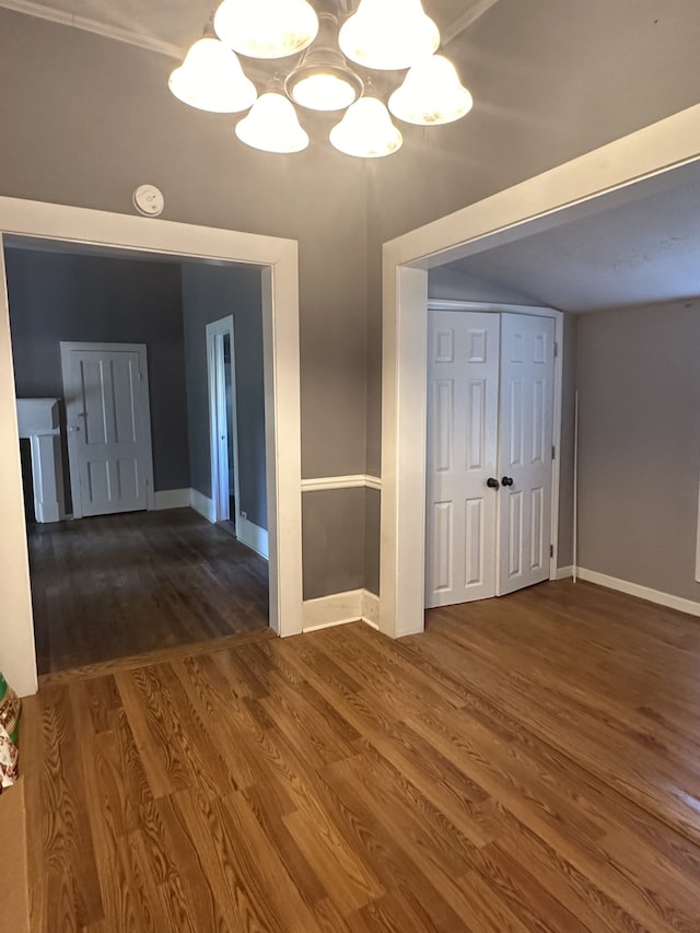 interior space featuring a notable chandelier and hardwood / wood-style floors