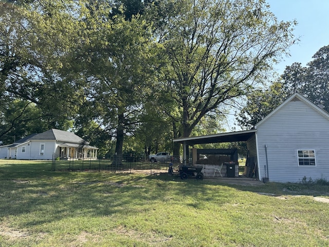 view of yard featuring a carport