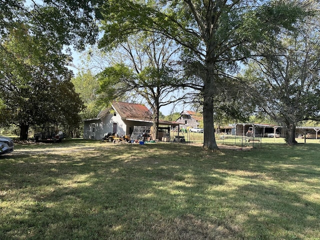1694 Verona Caney Rd, Lewisburg, TN 37091 - view of grassy yard with an outdoor structure