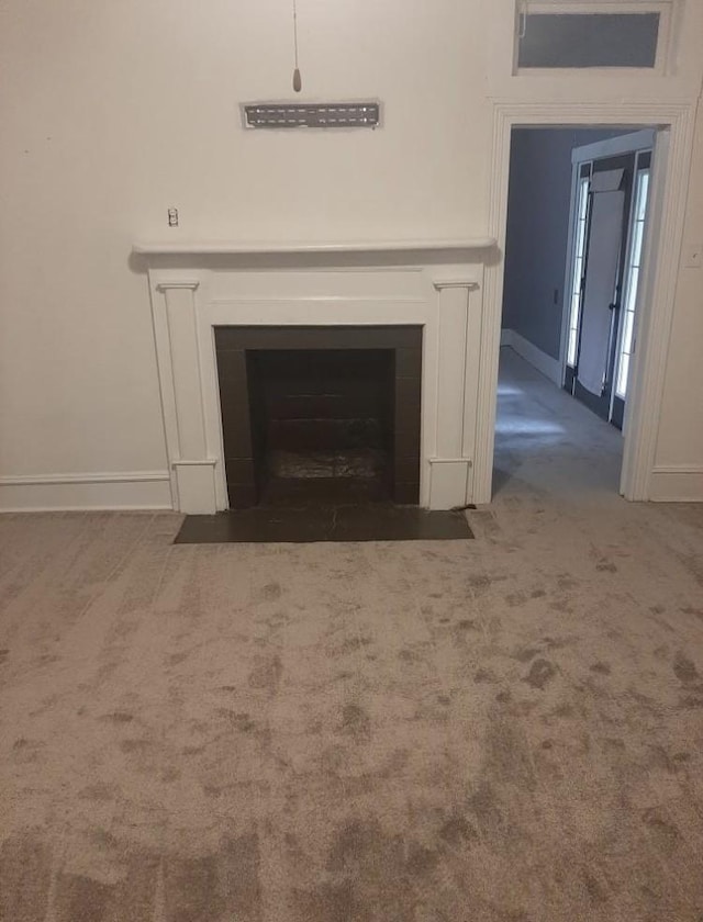 1694 Verona Caney Rd, Lewisburg, TN 37091 - detailed view of carpet floors, baseboards, and a fireplace with flush hearth