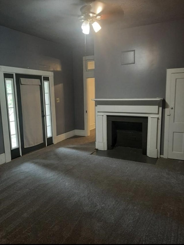 1694 Verona Caney Rd, Lewisburg, TN 37091 - unfurnished living room featuring a ceiling fan, carpet, a fireplace with flush hearth, and baseboards