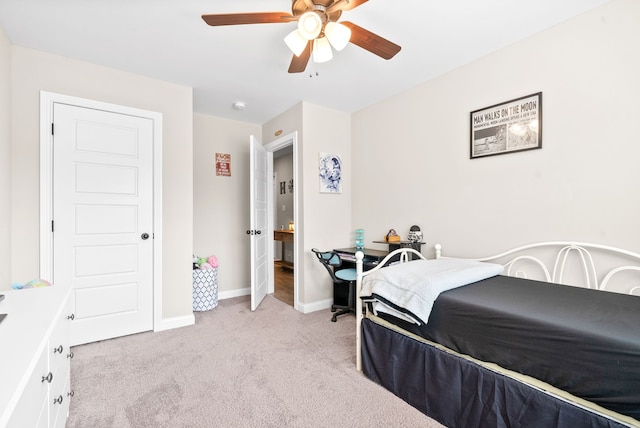 bedroom featuring light carpet and ceiling fan