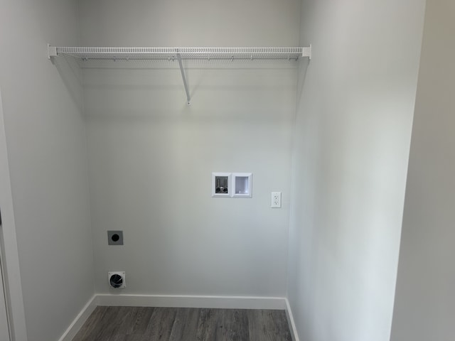 washroom featuring dark hardwood / wood-style flooring, hookup for a washing machine, and electric dryer hookup