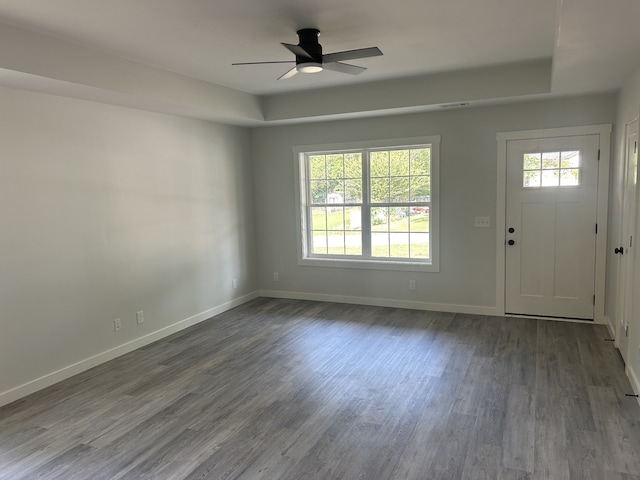 foyer entrance with ceiling fan and hardwood / wood-style floors