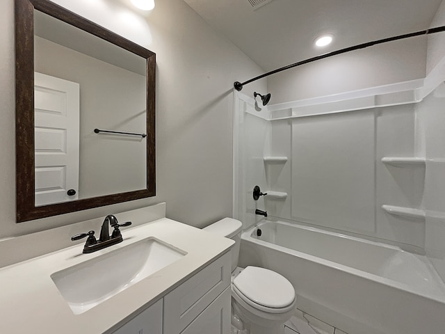 full bathroom featuring vanity, toilet, and bathtub / shower combination