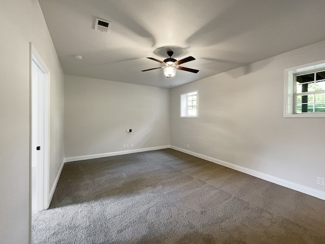 carpeted empty room with ceiling fan