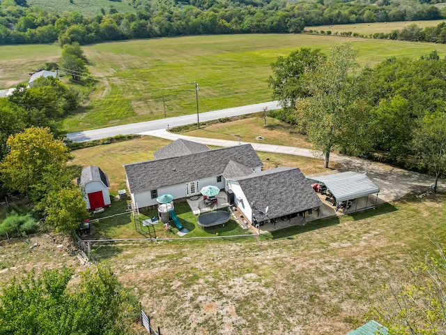 birds eye view of property featuring a rural view