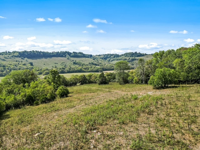 property view of mountains featuring a rural view