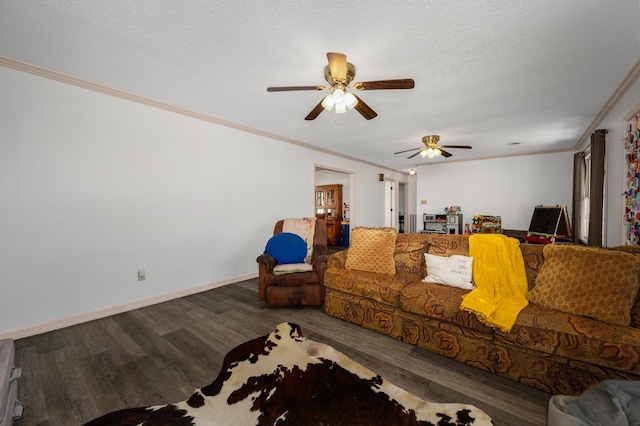 living room with a textured ceiling, crown molding, ceiling fan, and dark hardwood / wood-style flooring