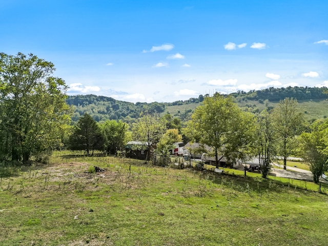 view of mountain feature with a rural view