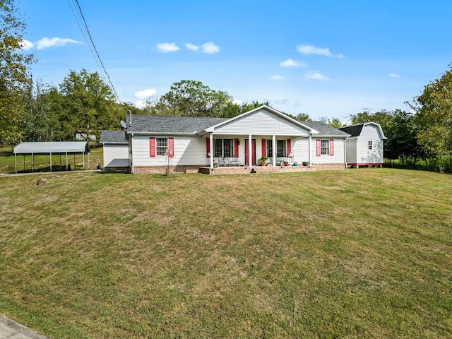 ranch-style home featuring covered porch and a front lawn