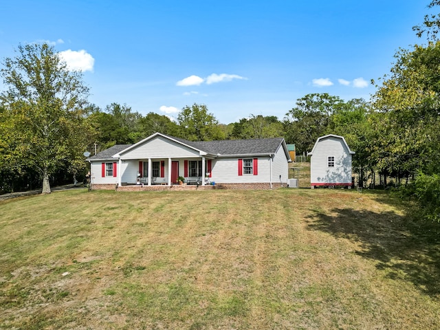 single story home featuring a front yard and covered porch