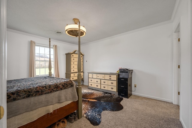 carpeted bedroom featuring ornamental molding and a textured ceiling