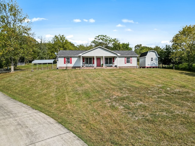 ranch-style home featuring a porch, a front lawn, and a carport