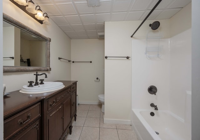 full bathroom with vanity, toilet, tile patterned floors, and shower / bath combination