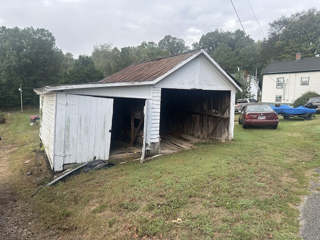 garage with a yard