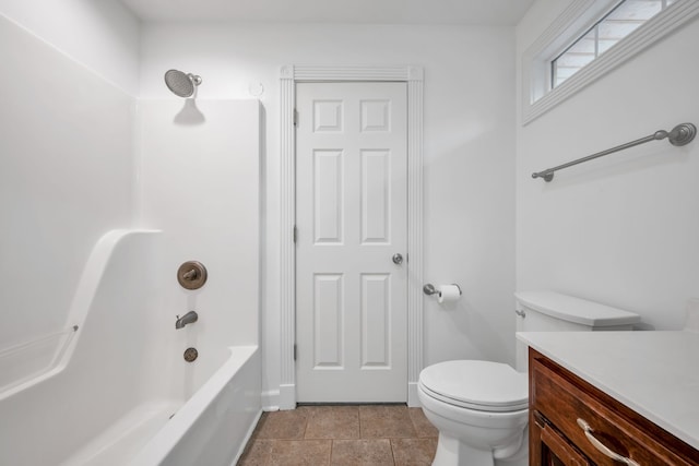 full bathroom featuring shower / bath combination, vanity, and toilet