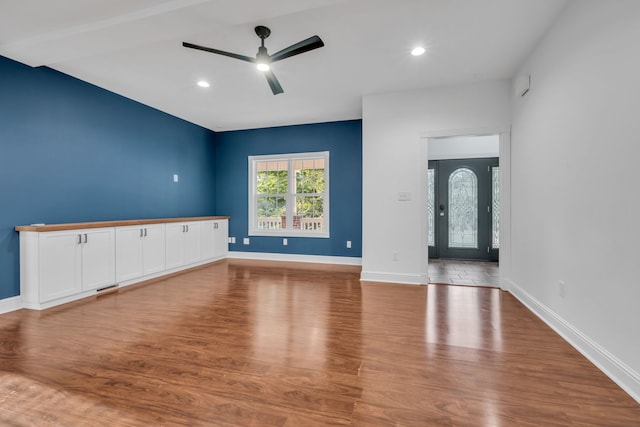 interior space featuring ceiling fan and light wood-type flooring