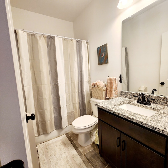 full bathroom with shower / bath combination with curtain, vanity, and toilet