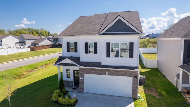 view of front facade featuring cooling unit, a front yard, and a garage