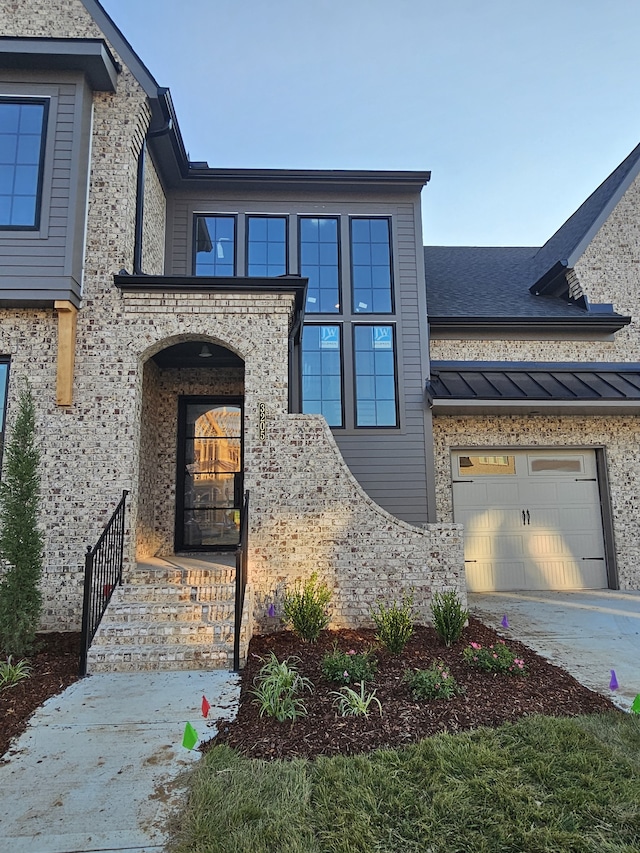 view of front of home with a garage