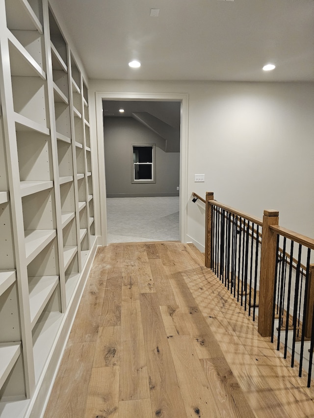 hallway with light wood-type flooring