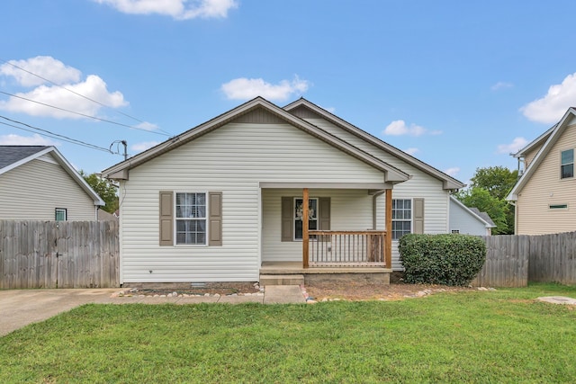 bungalow featuring a front lawn and a porch