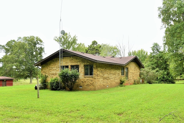 view of property exterior with a yard