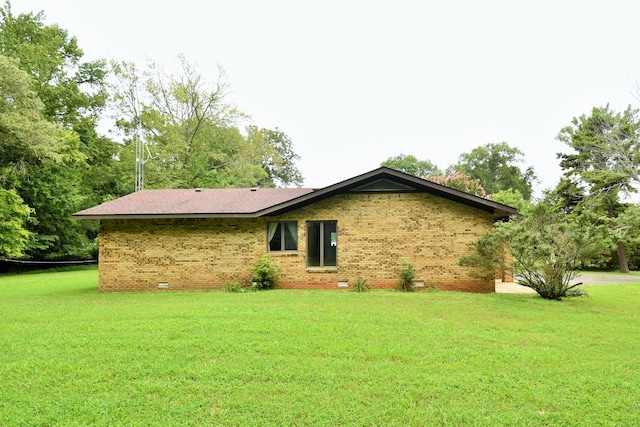 exterior space with a yard