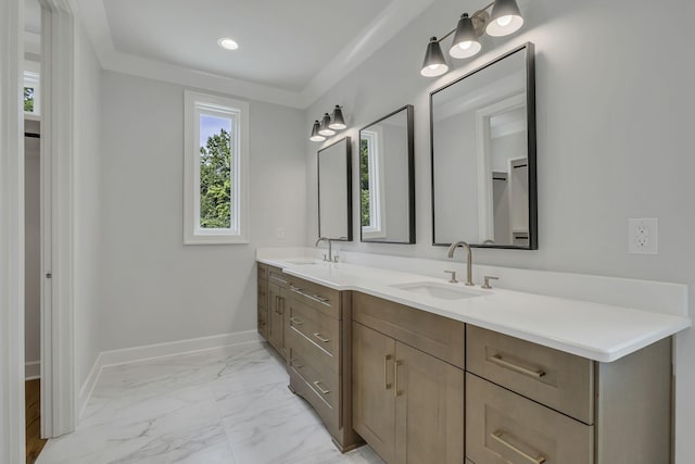 2704 Westwood Ave, Nashville, TN 37212 - bathroom featuring a sink, baseboards, double vanity, and marble finish floor