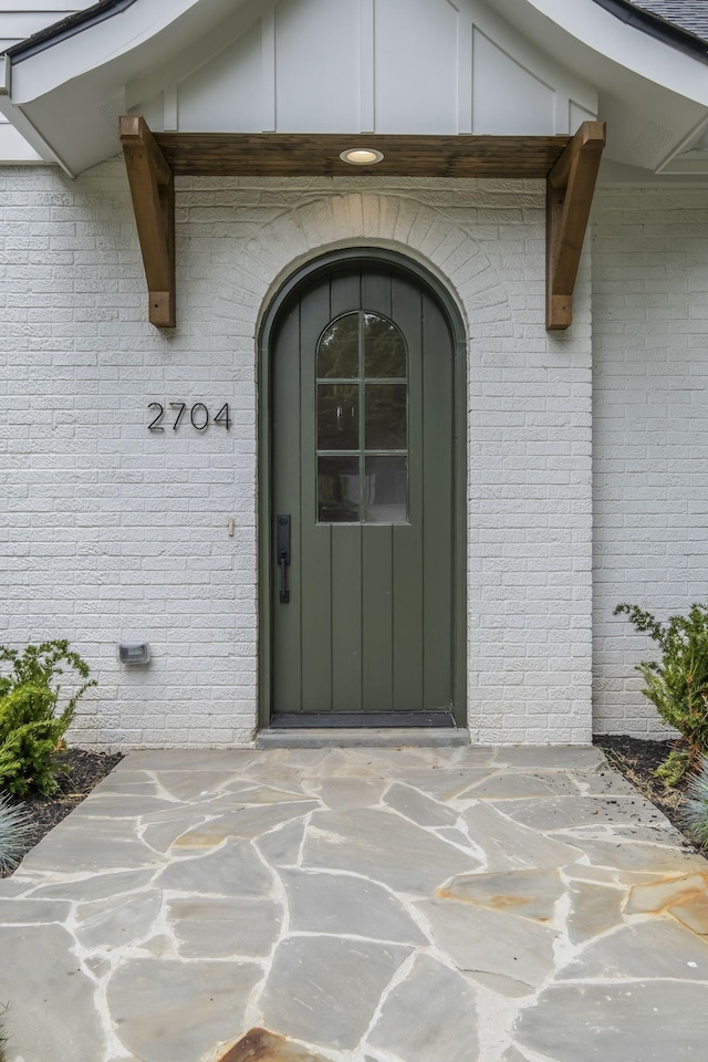 2704 Westwood Ave, Nashville, TN 37212 - view of exterior entry with brick siding and board and batten siding