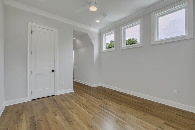 unfurnished bedroom featuring light hardwood / wood-style flooring and ceiling fan