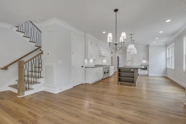 2704 Westwood Ave, Nashville, TN 37212 - kitchen with open shelves, custom exhaust hood, a sink, dark countertops, and range with two ovens