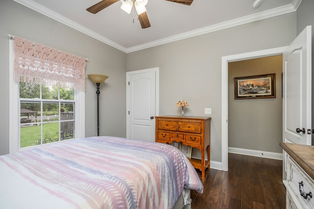 bedroom featuring ornamental molding, dark hardwood / wood-style flooring, and ceiling fan