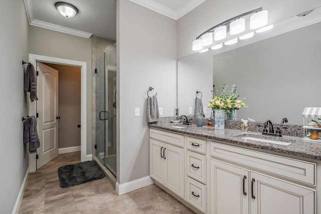 bathroom featuring crown molding, a shower with shower door, and vanity