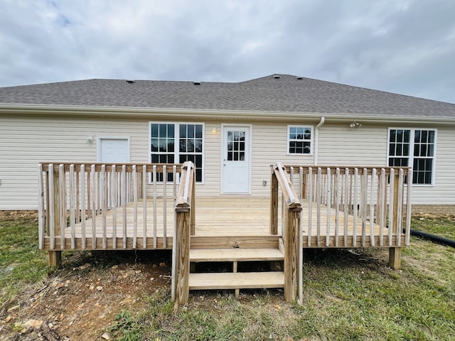 rear view of house with a deck