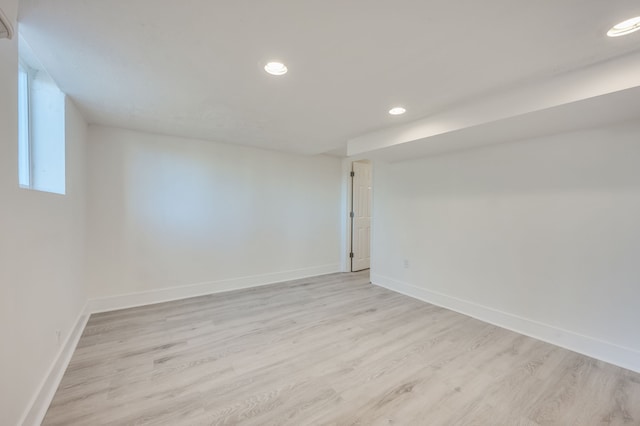 unfurnished room with light hardwood / wood-style flooring