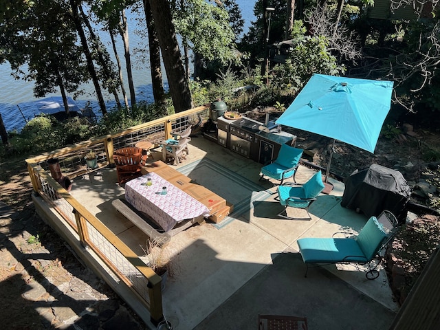 exterior space featuring an outdoor hangout area and a water view